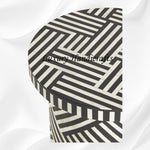 Black round side table with optical bone inlay design