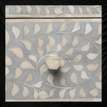 Bone Inlay Edge Floral Bedside Grey, handcrafted floral bedside table adding a touch of elegance to your room.