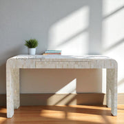 Chiseled bone inlay console table with curved edges