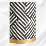 Luxury black round side table with geometric bone inlay